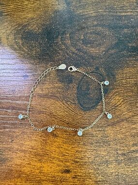 R.G Delicate Gold Chain Bracelet with Clear Gem Accents